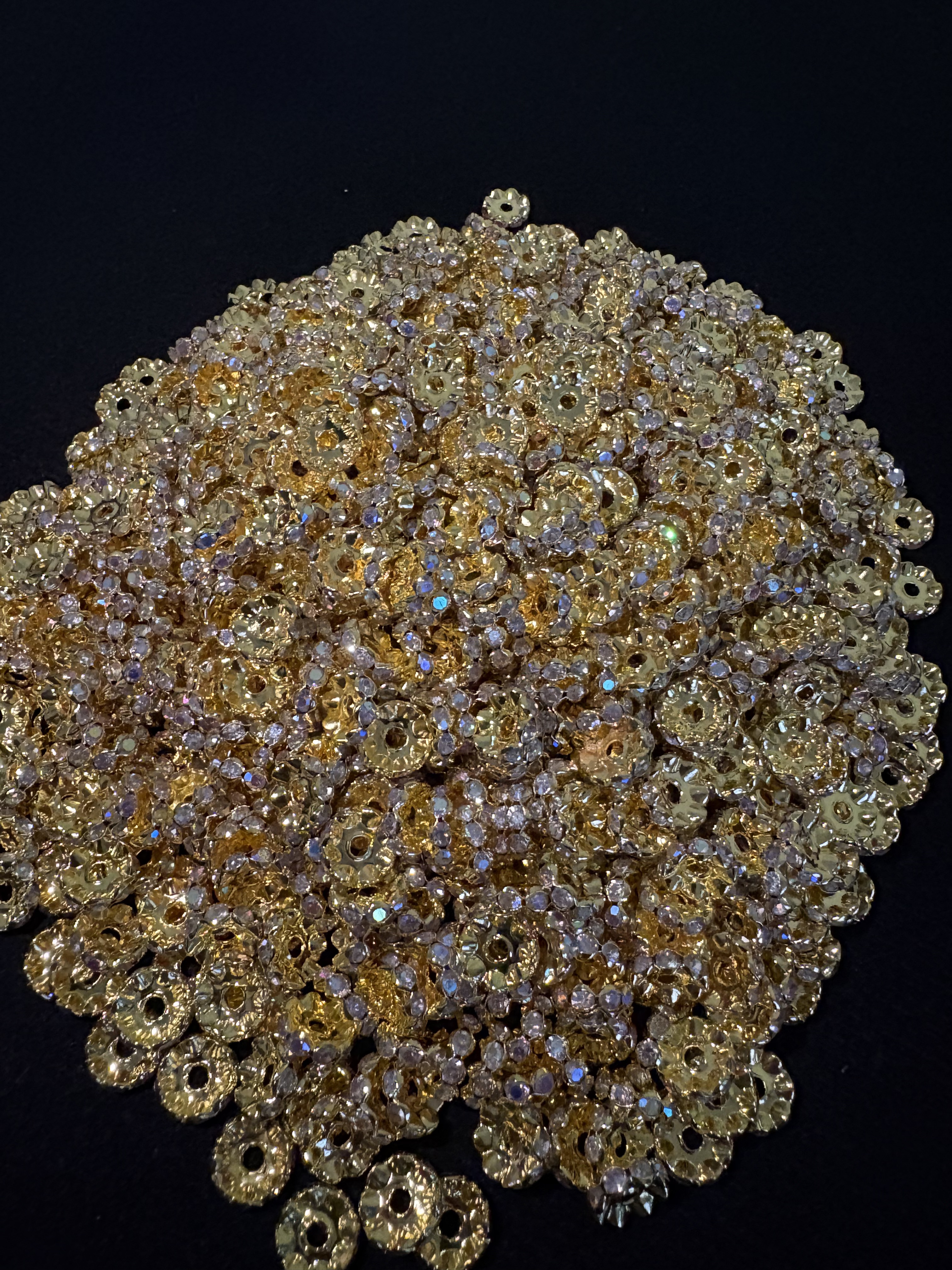 Wavy spacers for beaded pens