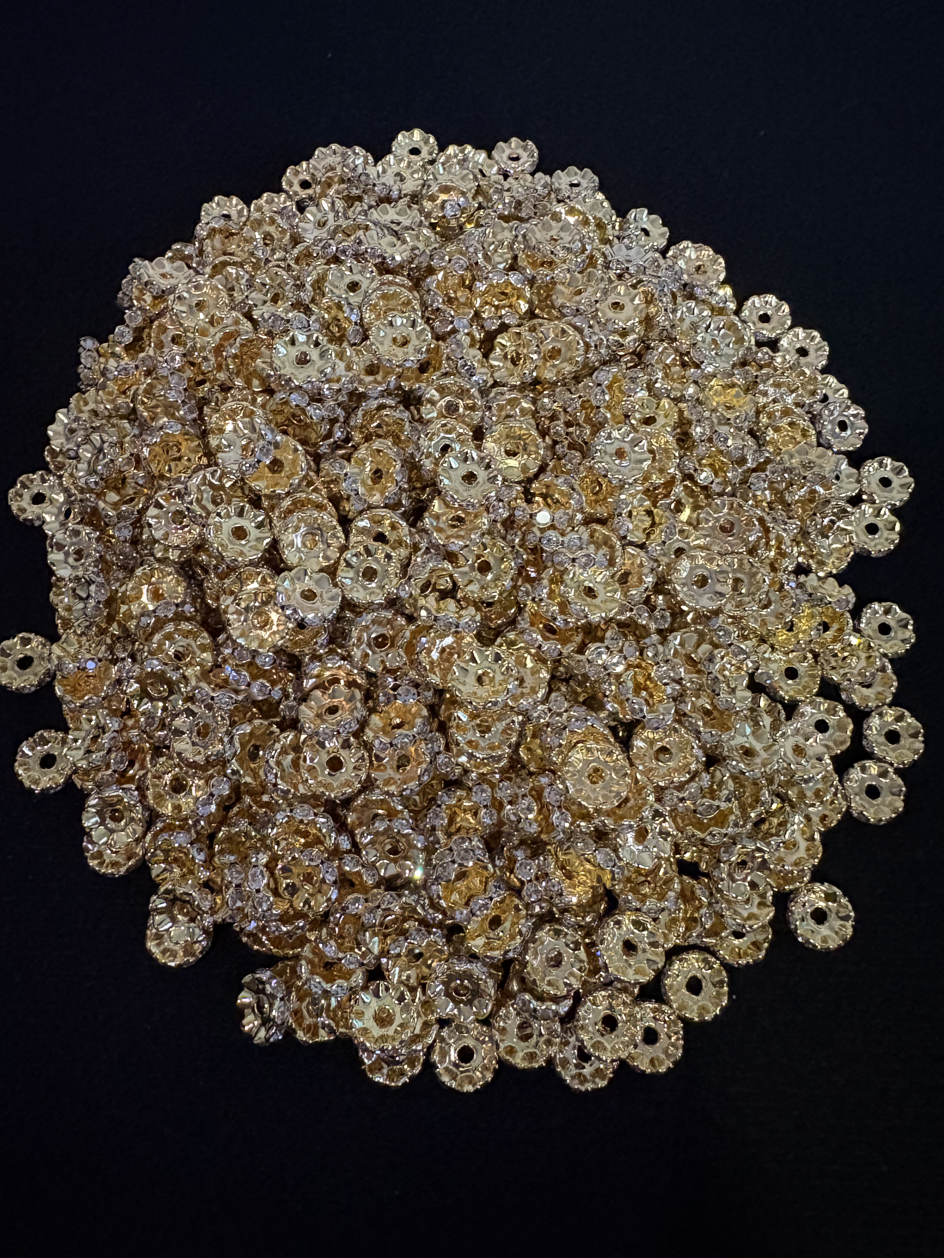 Wavy spacers for beaded pens