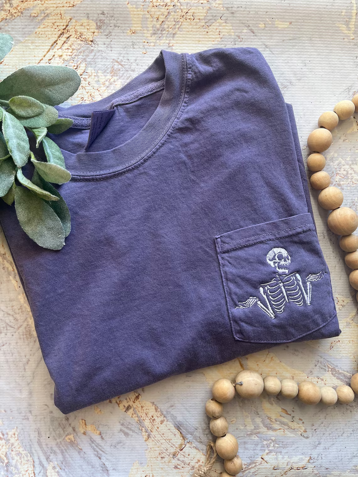 Embroidered Shrugging Skeleton T-shirt