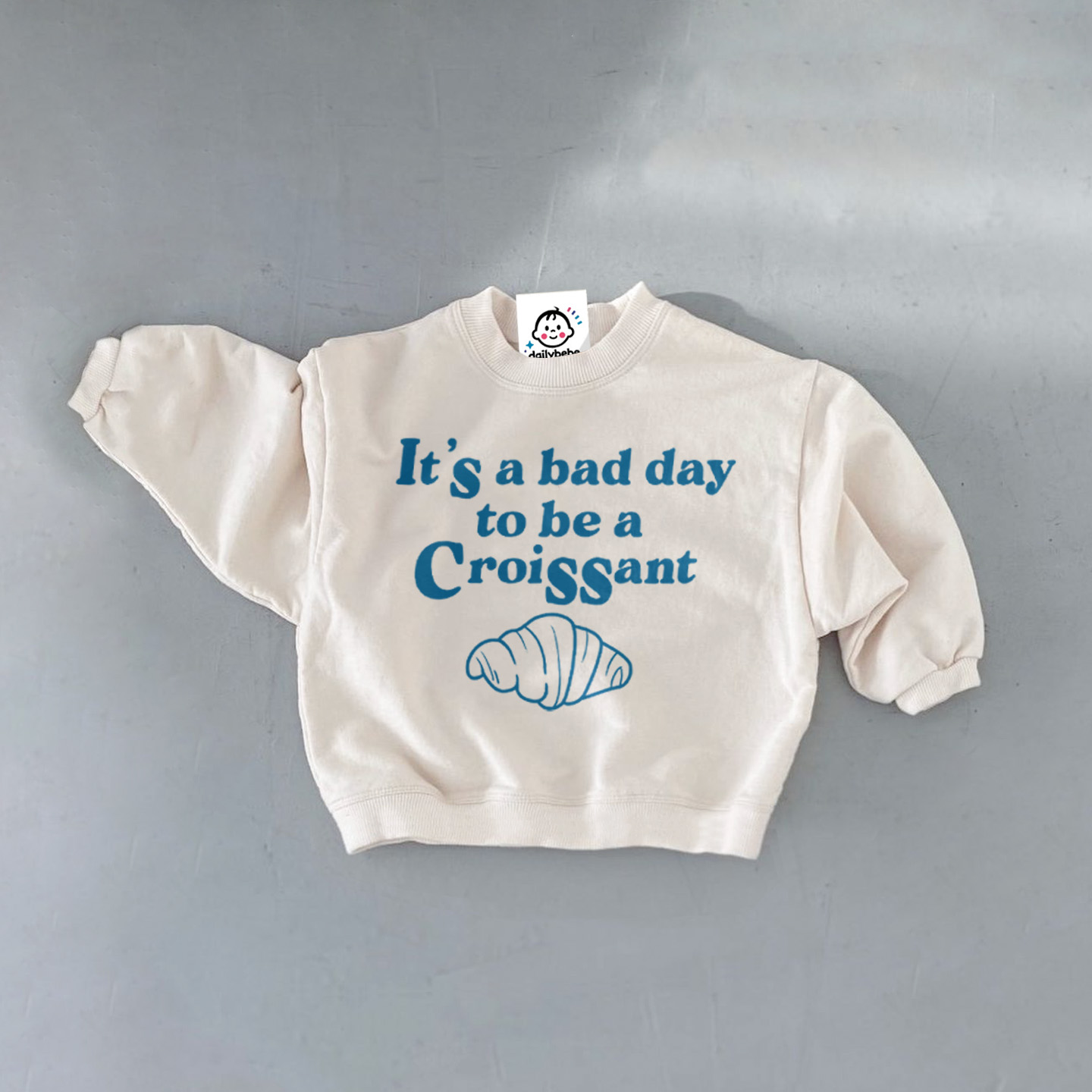 IT'S A BAD DAY TO BE A CROISSANT Baby Toddler White Sweatshirt