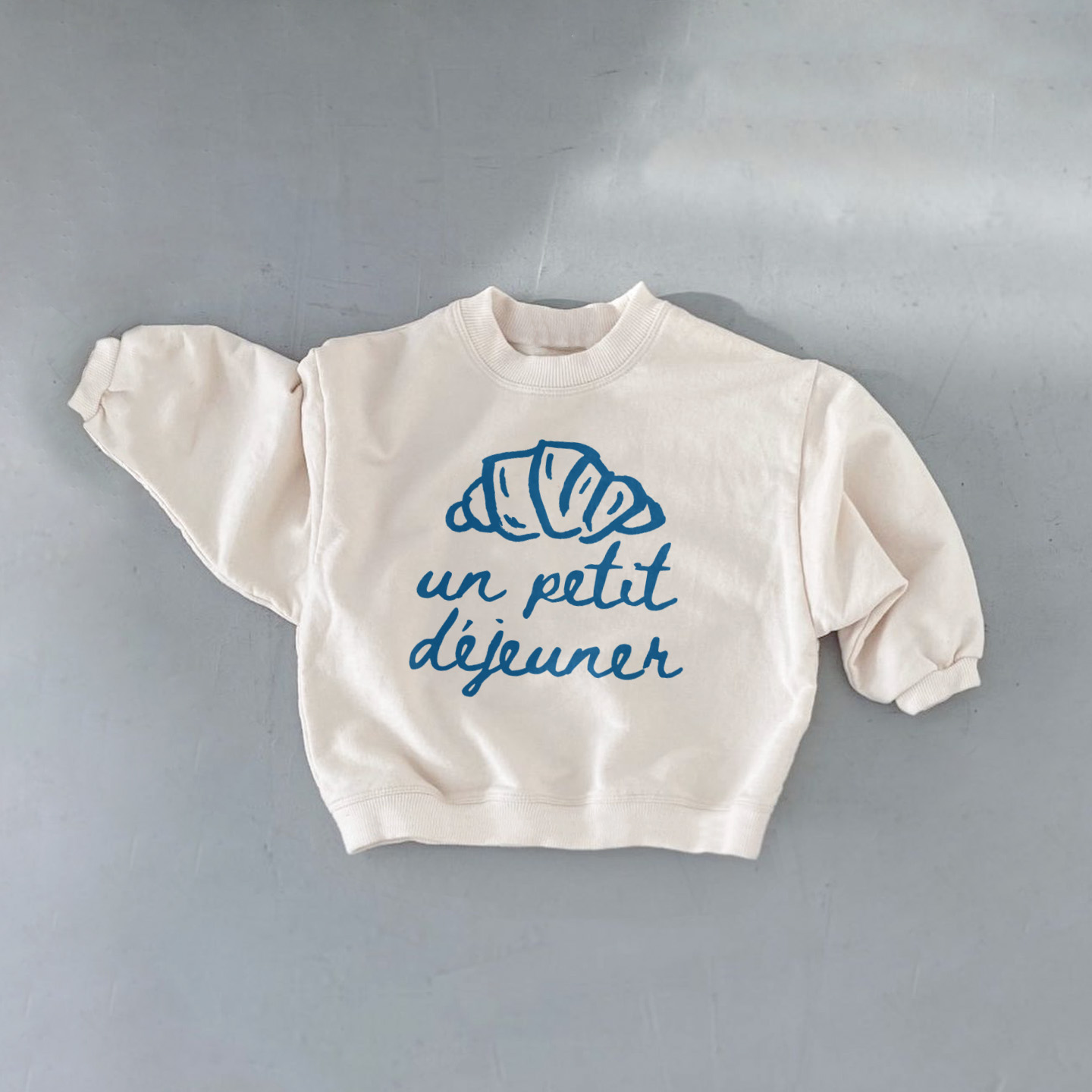 UN PETIT DEJEUNEI Baby Toddler Croissant T-Shirt