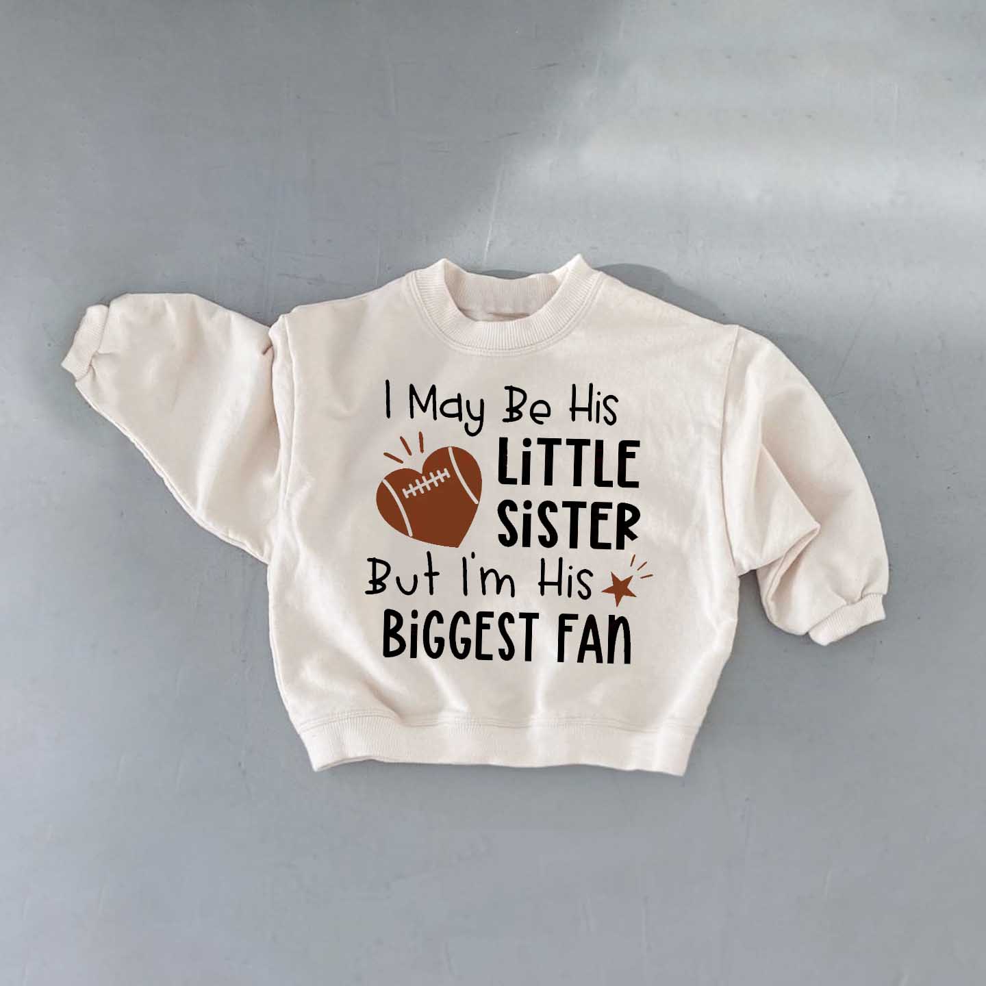 I MAY BE HIS LITTLE SISTER BUT I'M HIS BIGGEST FAN Baby & Kids Sweatshirt