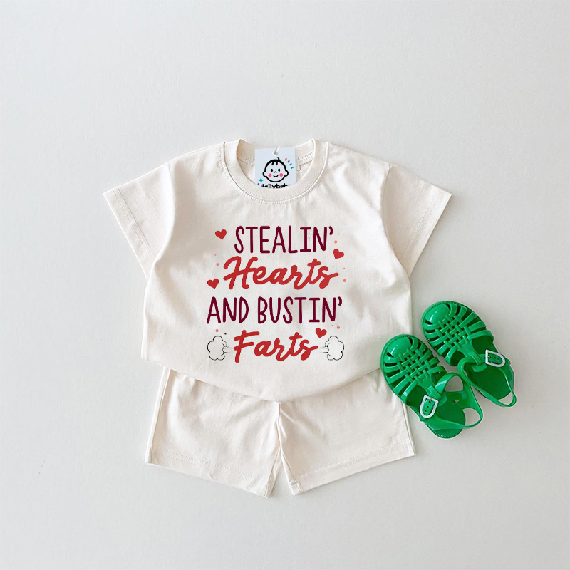 STEALIN' HEARTS AND BUSTIN' FARTS Baby Slogan Set 