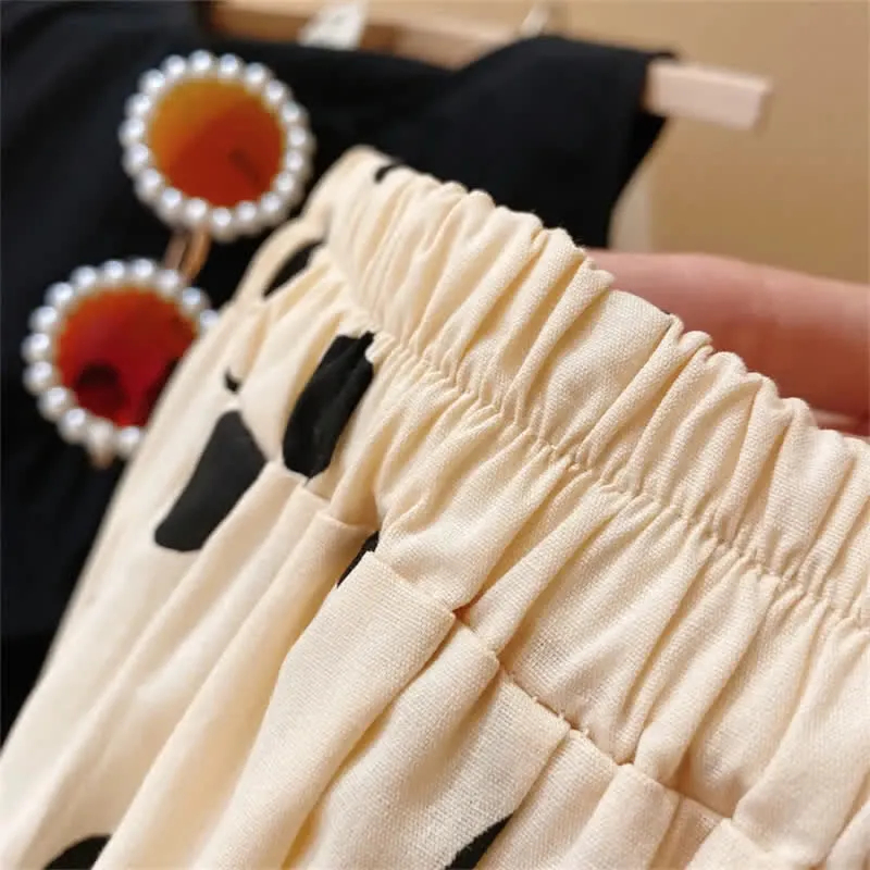 Toddler 2-Piece Sleeveless Black Dots Set