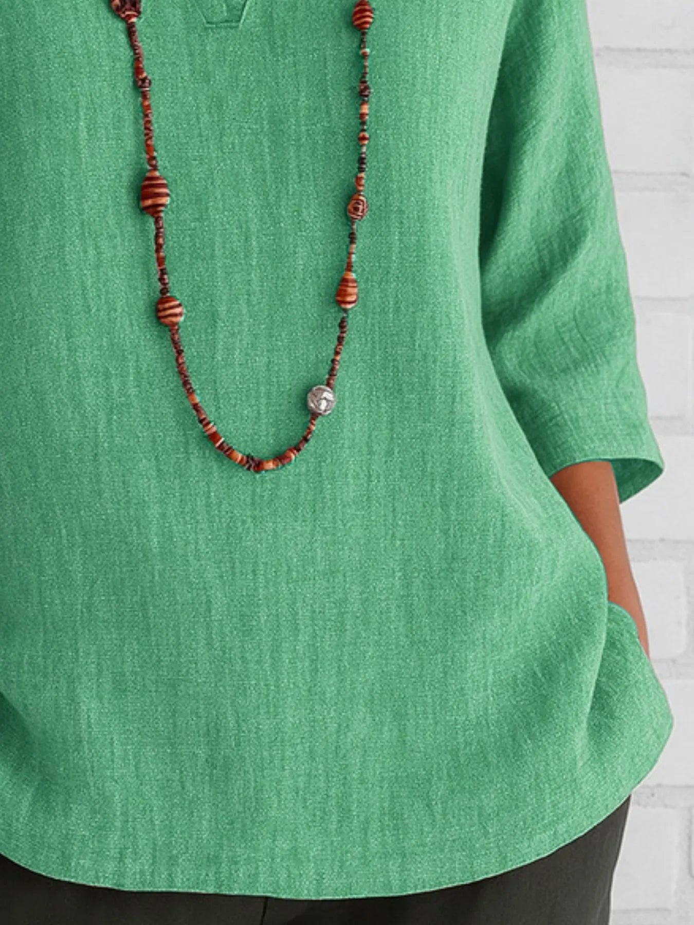 Three-quarter sleeve slit shirt