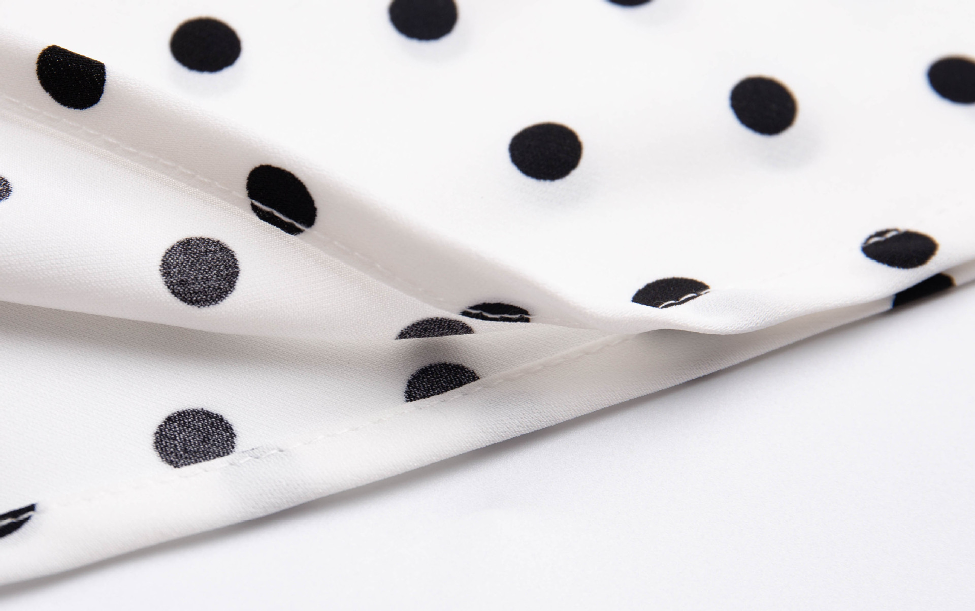 Holiday style polka dot halter neck dress