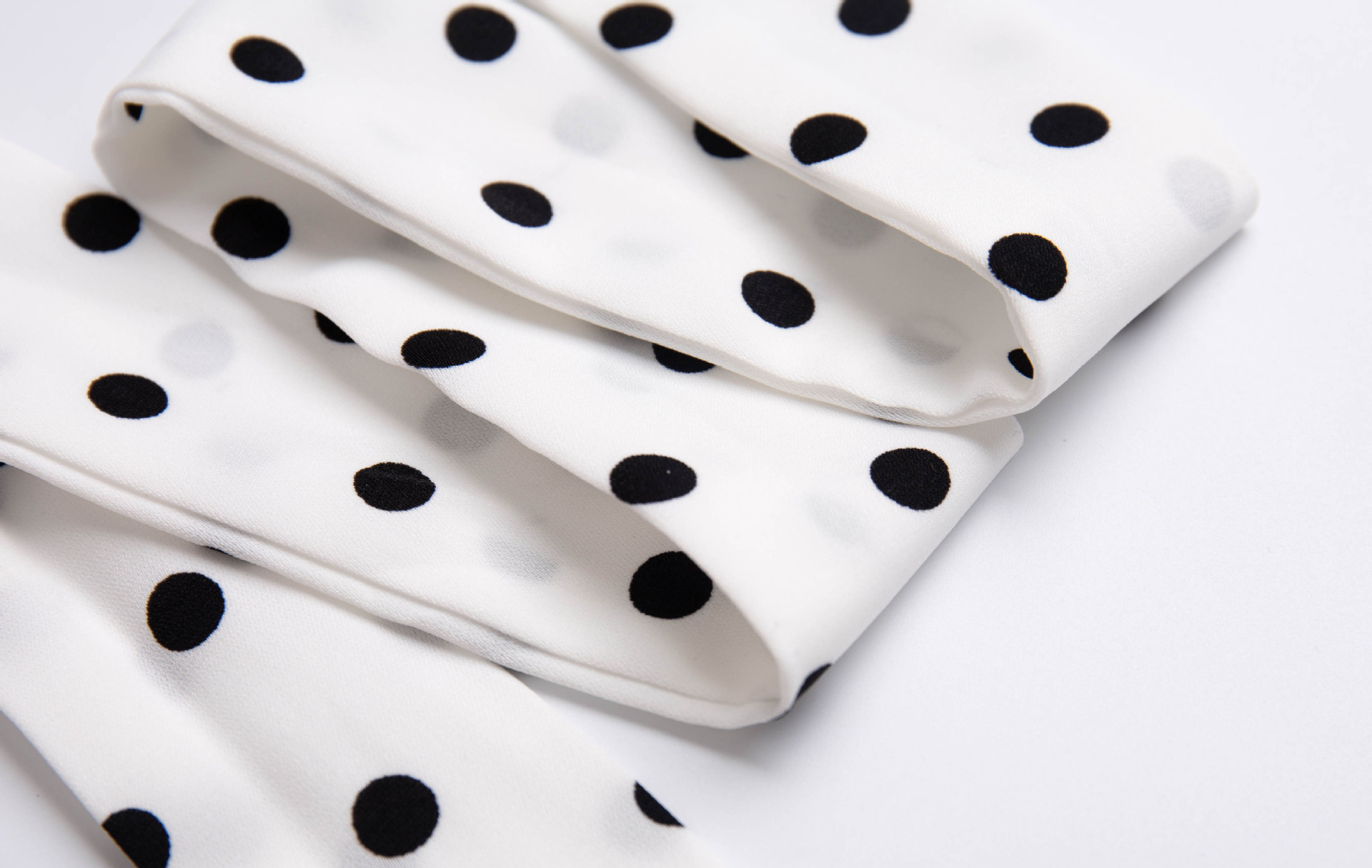 Holiday style polka dot halter neck dress