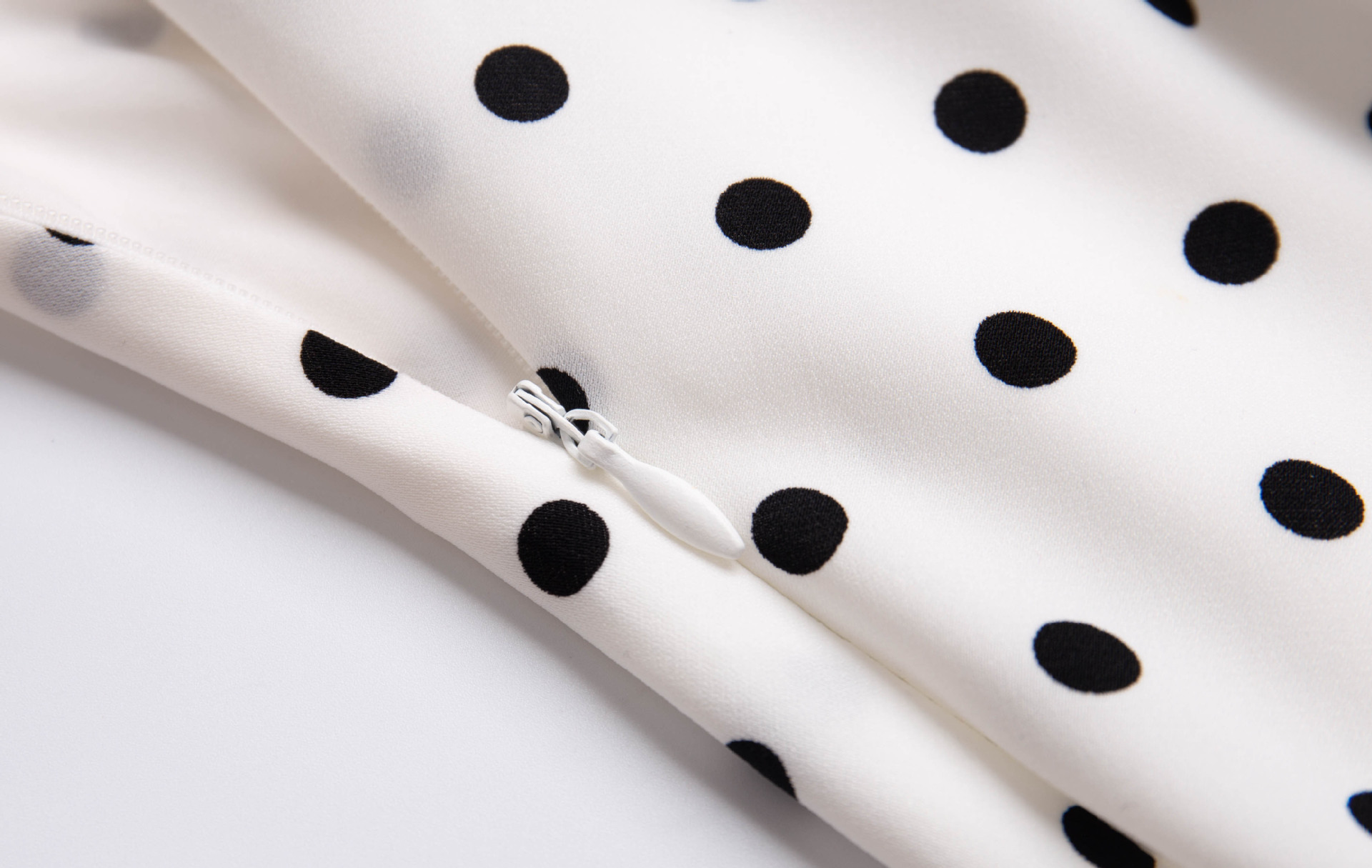 Holiday style polka dot halter neck dress