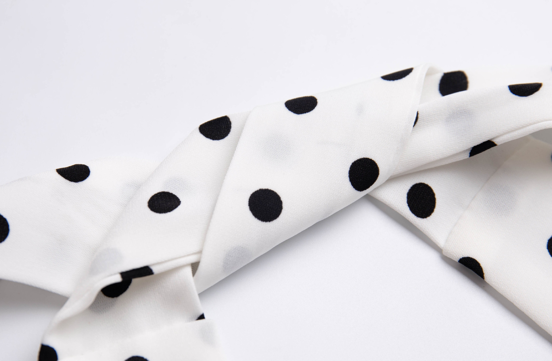 Holiday style polka dot halter neck dress