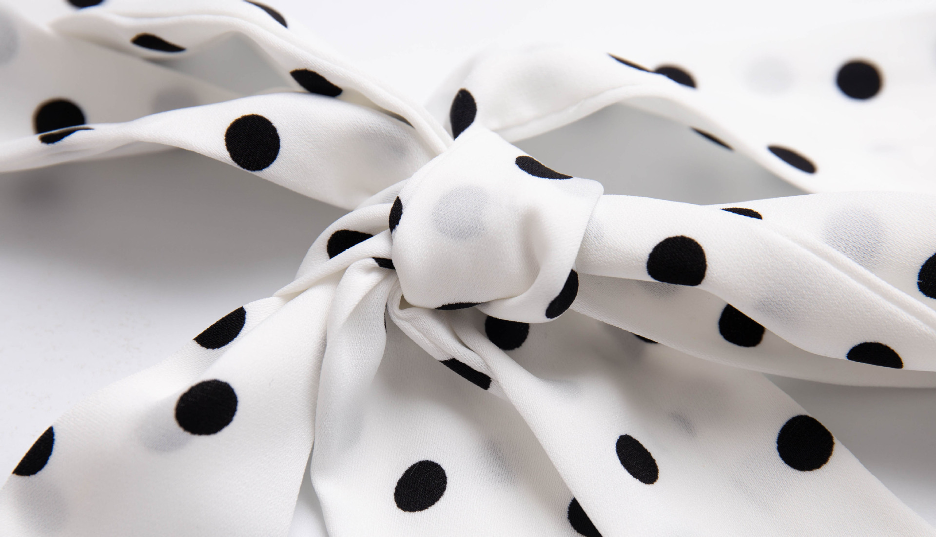 Holiday style polka dot halter neck dress