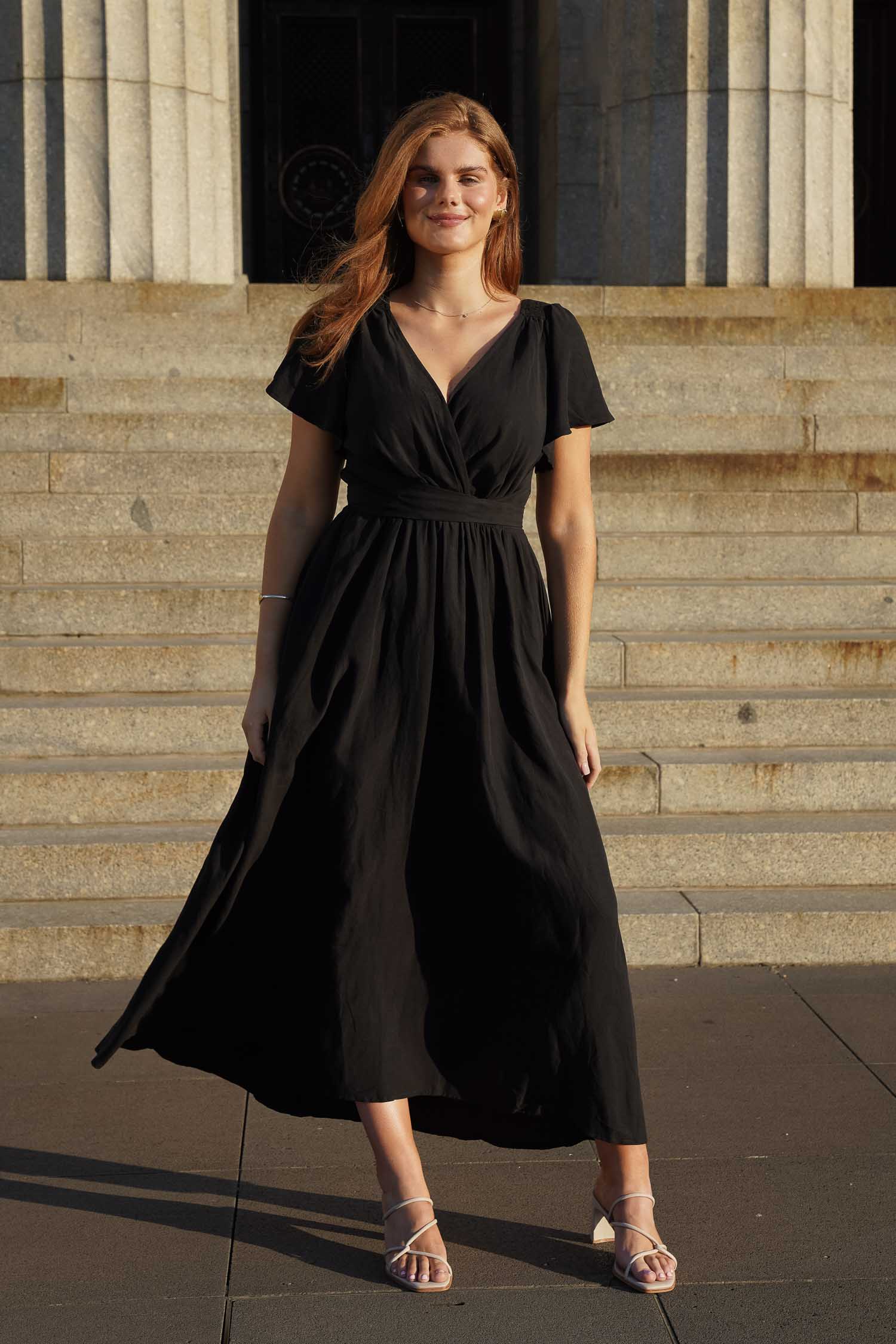 Long dress with flowing sleeves