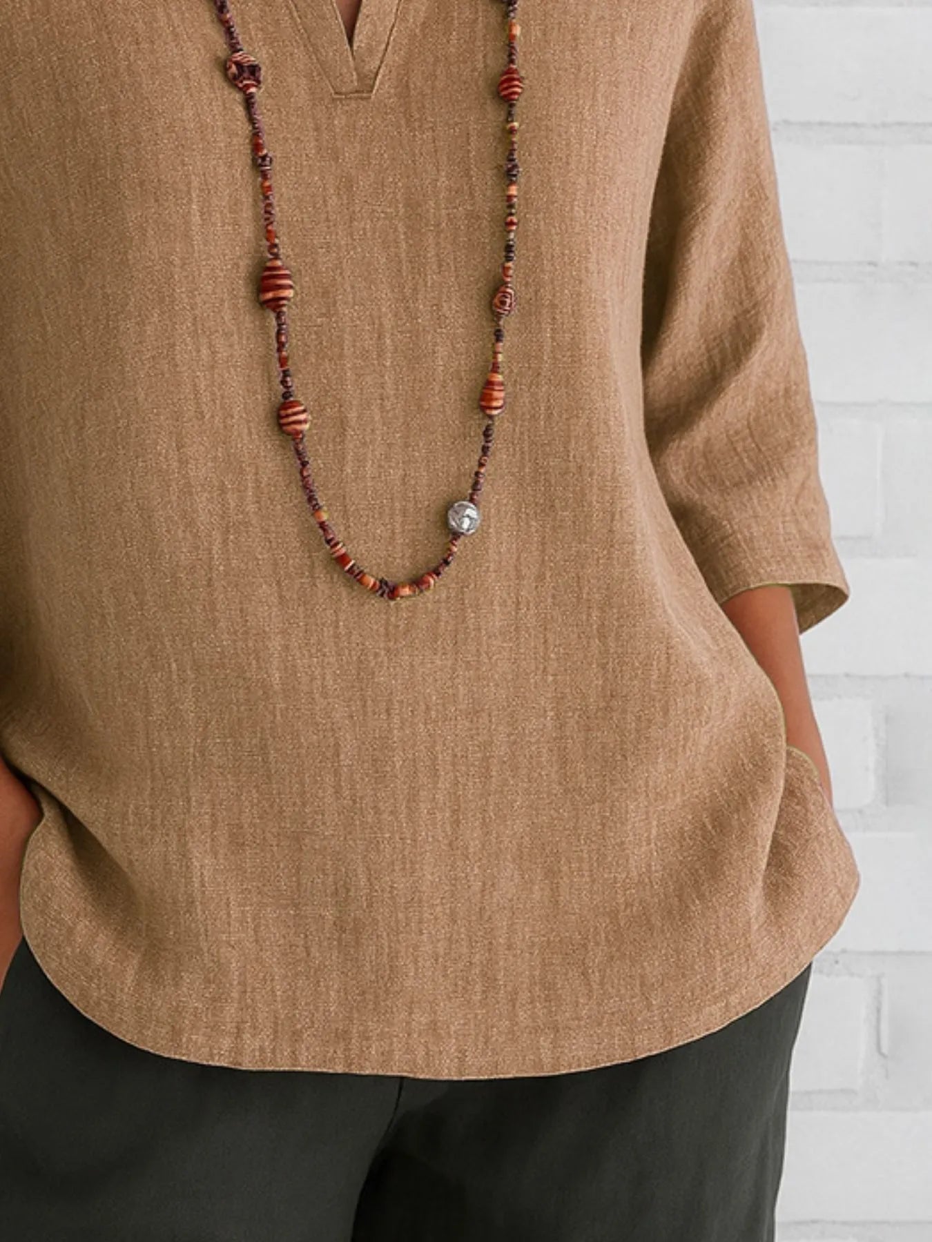 Three-quarter sleeve slit shirt