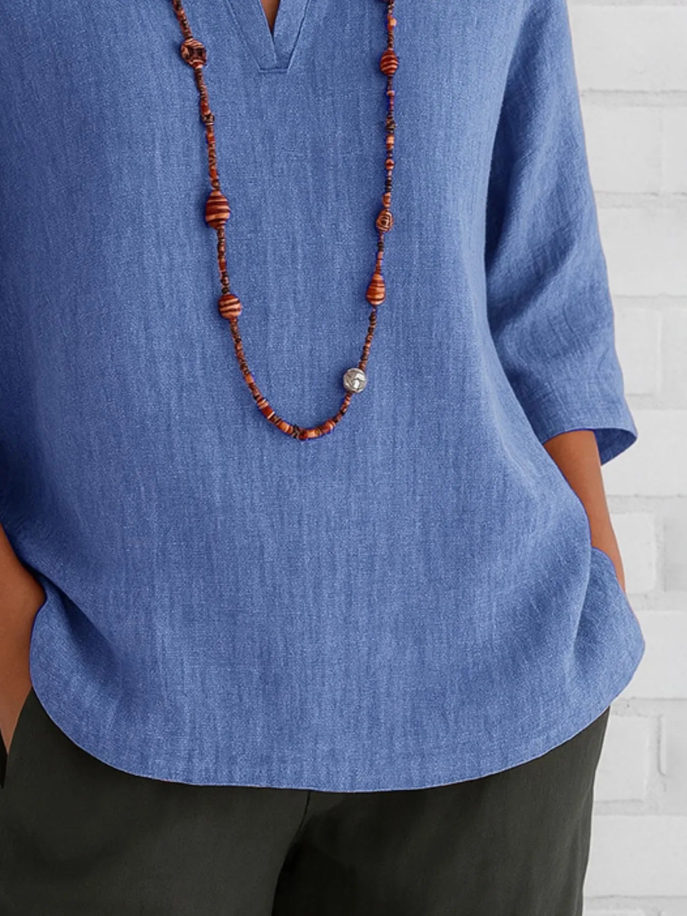 Three-quarter sleeve slit shirt