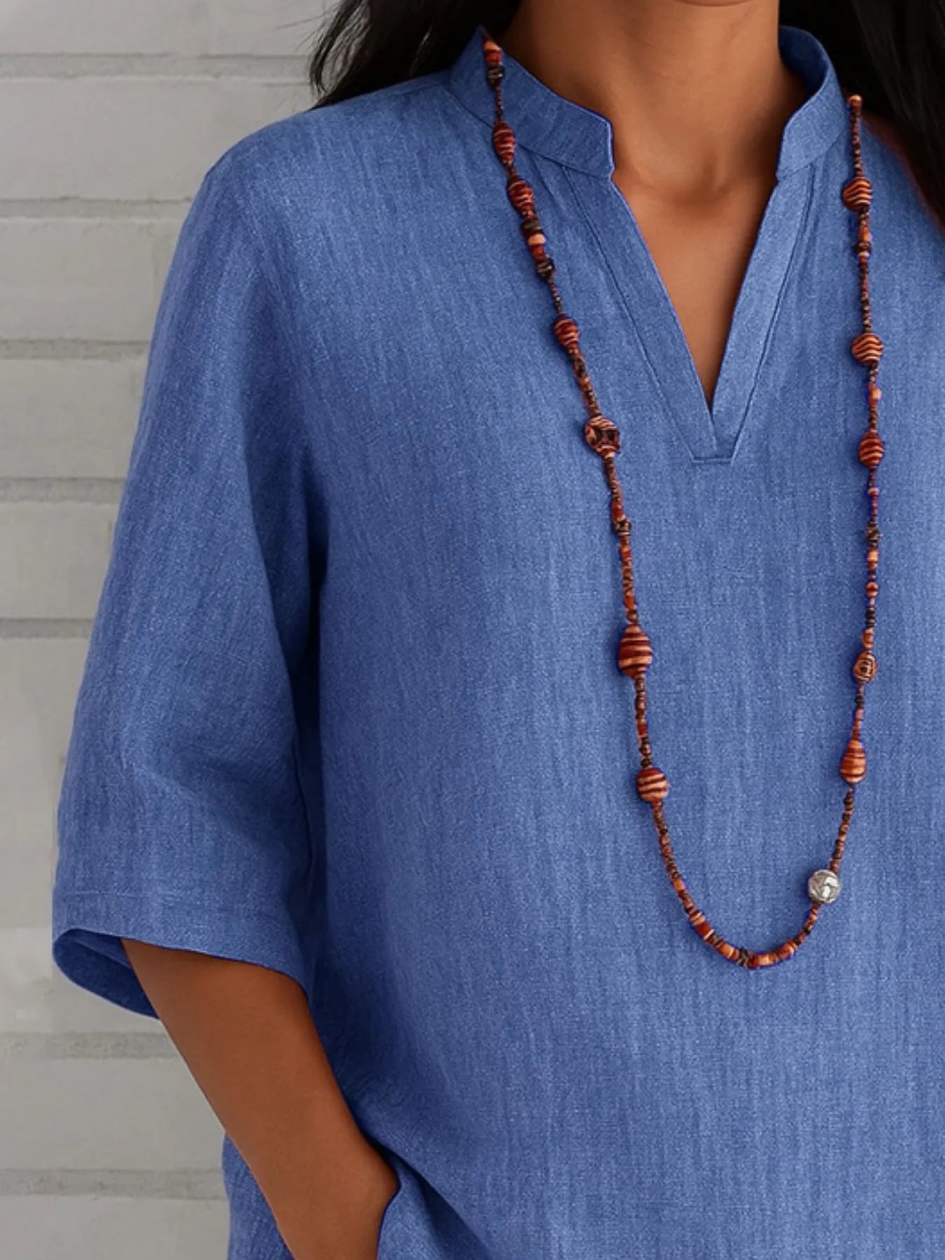 Three-quarter sleeve slit shirt