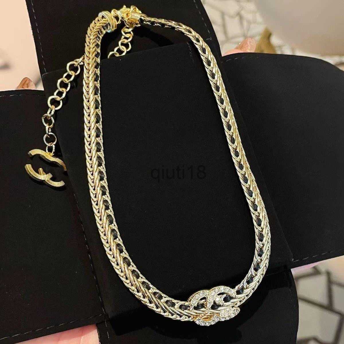 Black leather chain double C stirrup bracelet