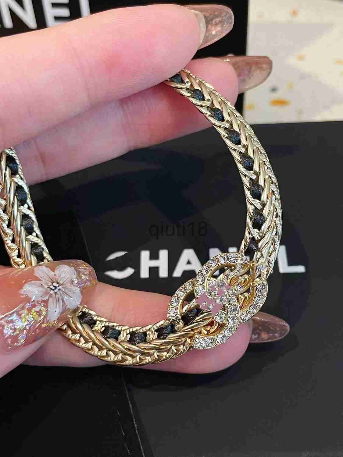 Black leather chain double C stirrup bracelet