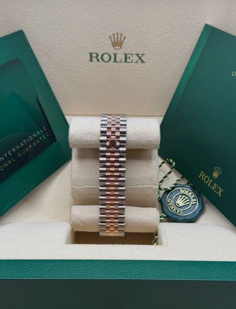 Rolex Datejust 31 NEW 2025 Sun Dust Pink Roman Dial Two Tone Rose Gold Fluted