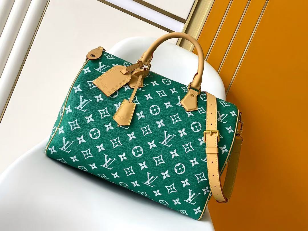 dark green LV speedy bag
