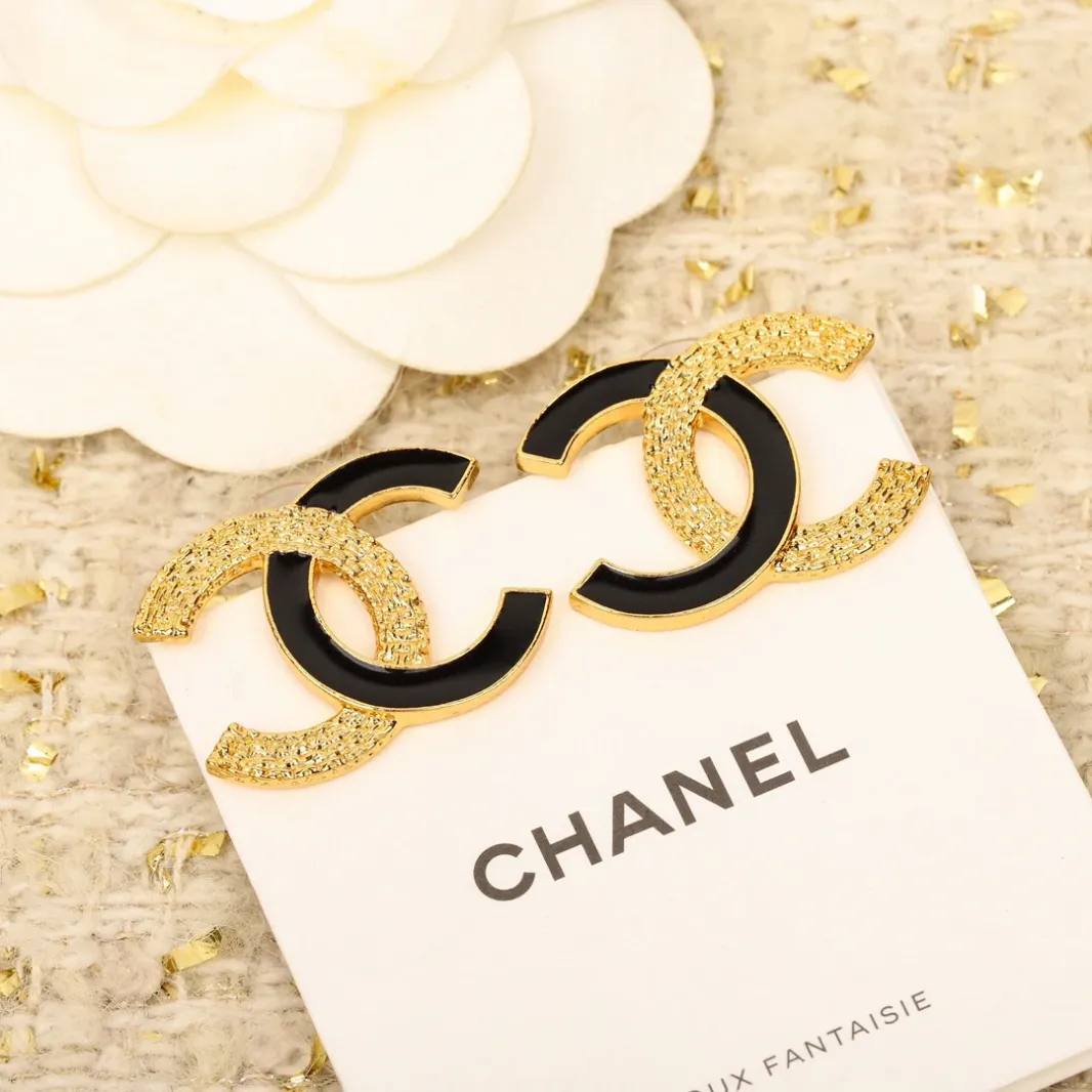 CCE444 CC Black enamel gold embossed stud earrings