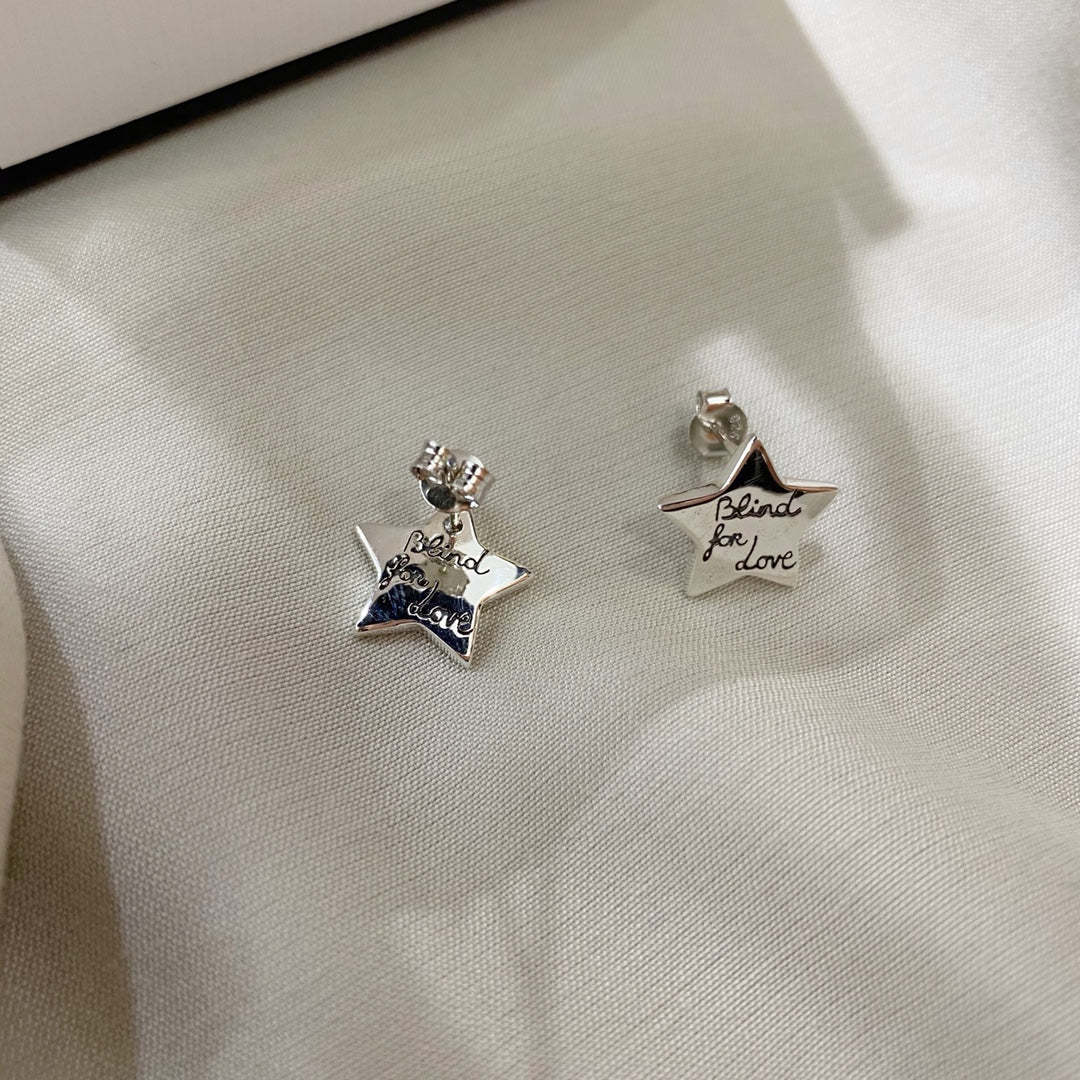 SILVER BLIND FOR LOVE STAR EARRINGS