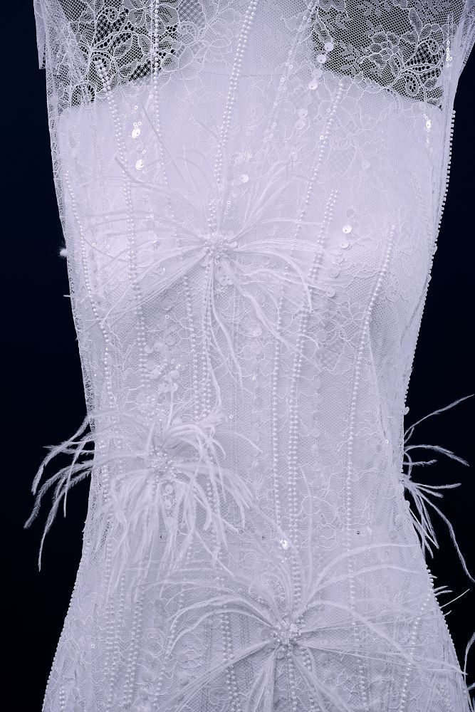 Elegant 3D floral beaded tulle fabric with uncontaminated feathers sparkling sequin bridal gown