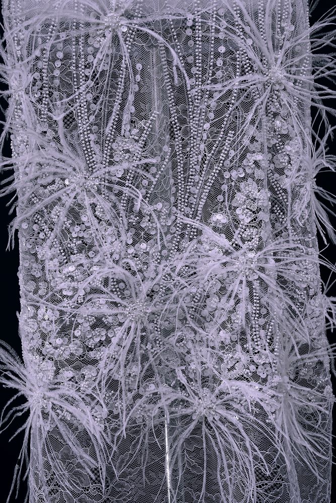 Elegant 3D floral beaded tulle fabric with uncontaminated feathers sparkling sequin bridal gown