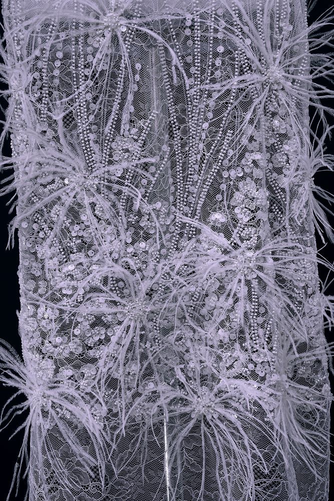 Elegant 3D floral beaded tulle fabric with uncontaminated feathers sparkling sequin bridal gown