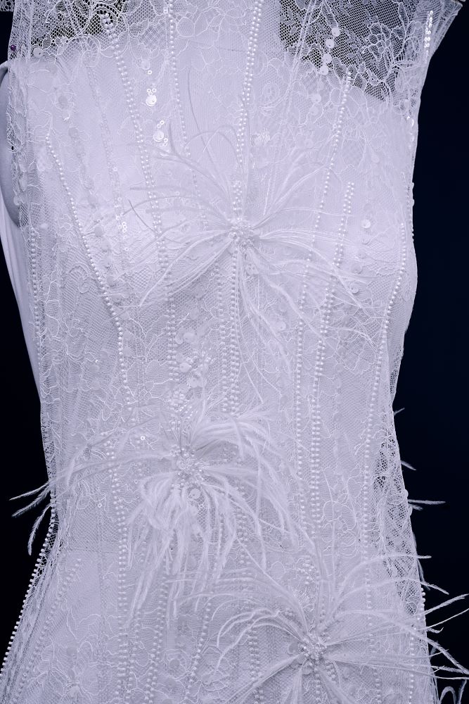 Elegant 3D floral beaded tulle fabric with uncontaminated feathers sparkling sequin bridal gown