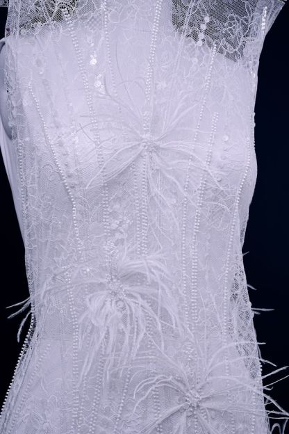 Elegant 3D floral beaded tulle fabric with uncontaminated feathers sparkling sequin bridal gown