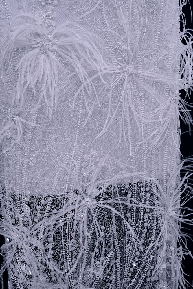 Elegant 3D floral beaded tulle fabric with uncontaminated feathers sparkling sequin bridal gown