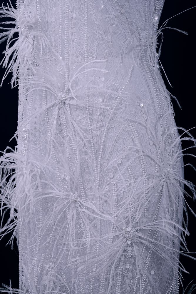 Elegant 3D floral beaded tulle fabric with uncontaminated feathers sparkling sequin bridal gown