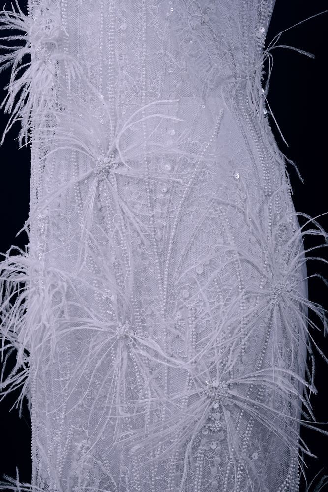Elegant 3D floral beaded tulle fabric with uncontaminated feathers sparkling sequin bridal gown
