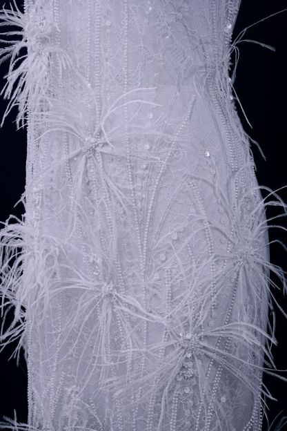 Elegant 3D floral beaded tulle fabric with uncontaminated feathers sparkling sequin bridal gown