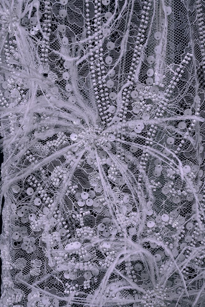 Elegant 3D floral beaded tulle fabric with uncontaminated feathers sparkling sequin bridal gown