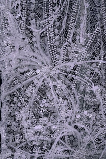 Elegant 3D floral beaded tulle fabric with uncontaminated feathers sparkling sequin bridal gown