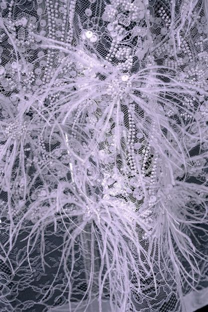 Elegant 3D floral beaded tulle fabric with uncontaminated feathers sparkling sequin bridal gown