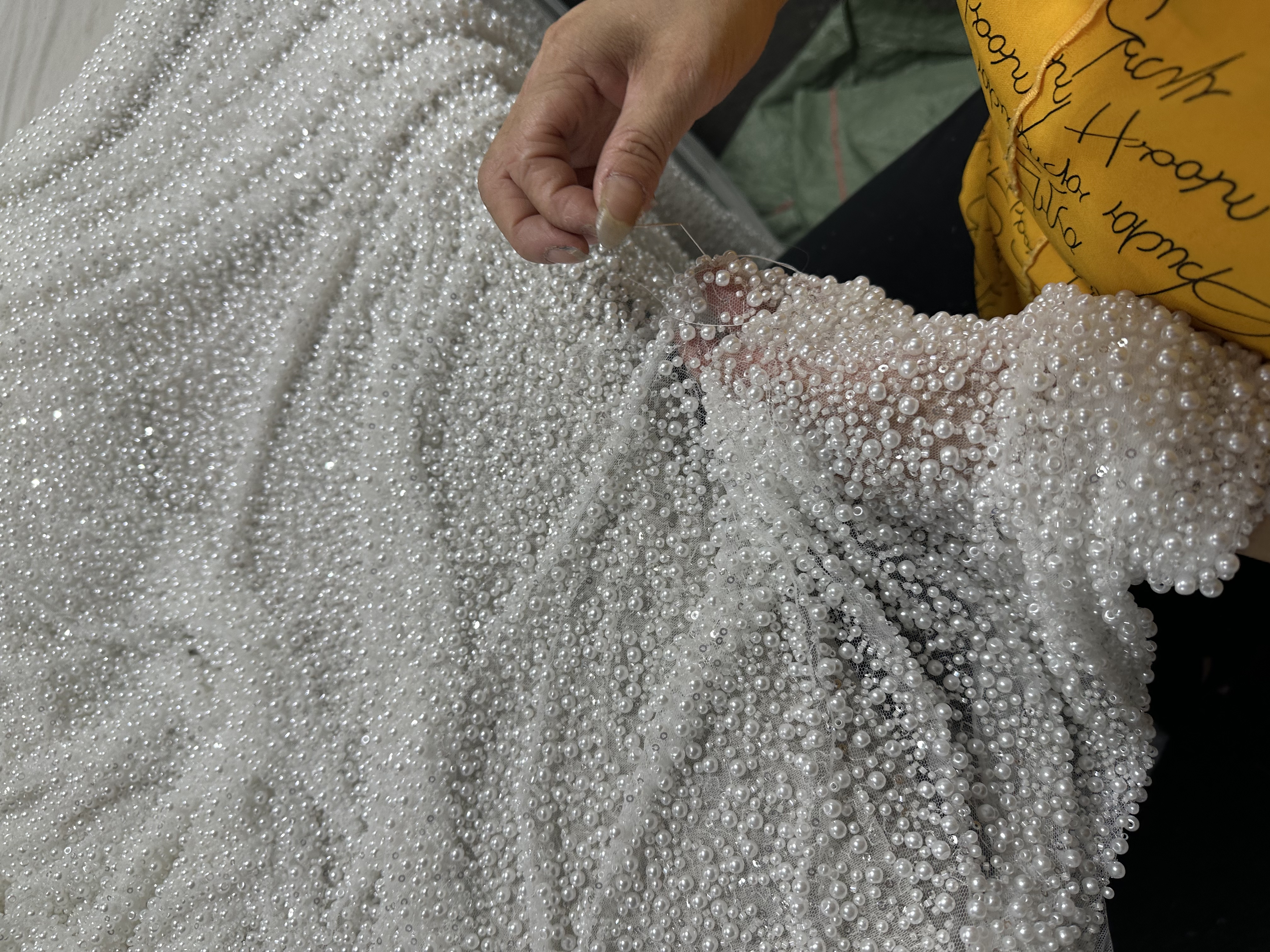 {"default":"Sita Lace, Lace Fabric, Feature Fabric, Tulle Fabric, Beaded Fabric, Sequined Fabric, Embroidery Fabric, Wedding Dress, Bridal Gown, Bridal Veil, Beads, Sequins,"}