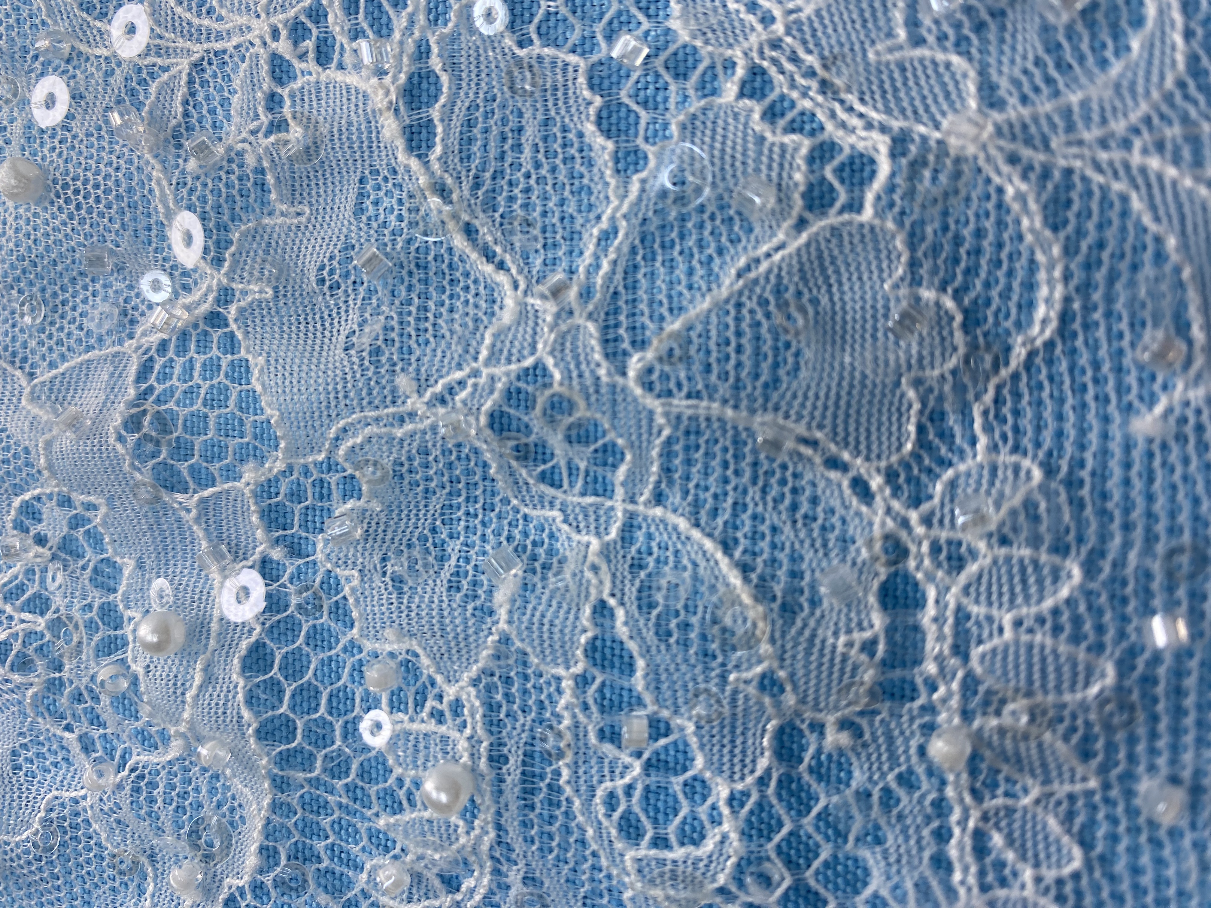 Ivory Fabric with Exquisite Floral Embroidery! Features Delicate Leaf Patterns, Perfect for Wedding Dresses/Chic Evening Wear. Premium Craft—Shop Now!