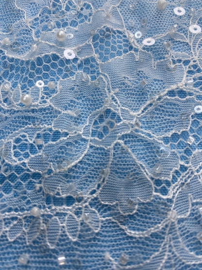 Ivory Fabric with Exquisite Floral Embroidery! Features Delicate Leaf Patterns, Perfect for Wedding Dresses/Chic Evening Wear. Premium Craft—Shop Now!