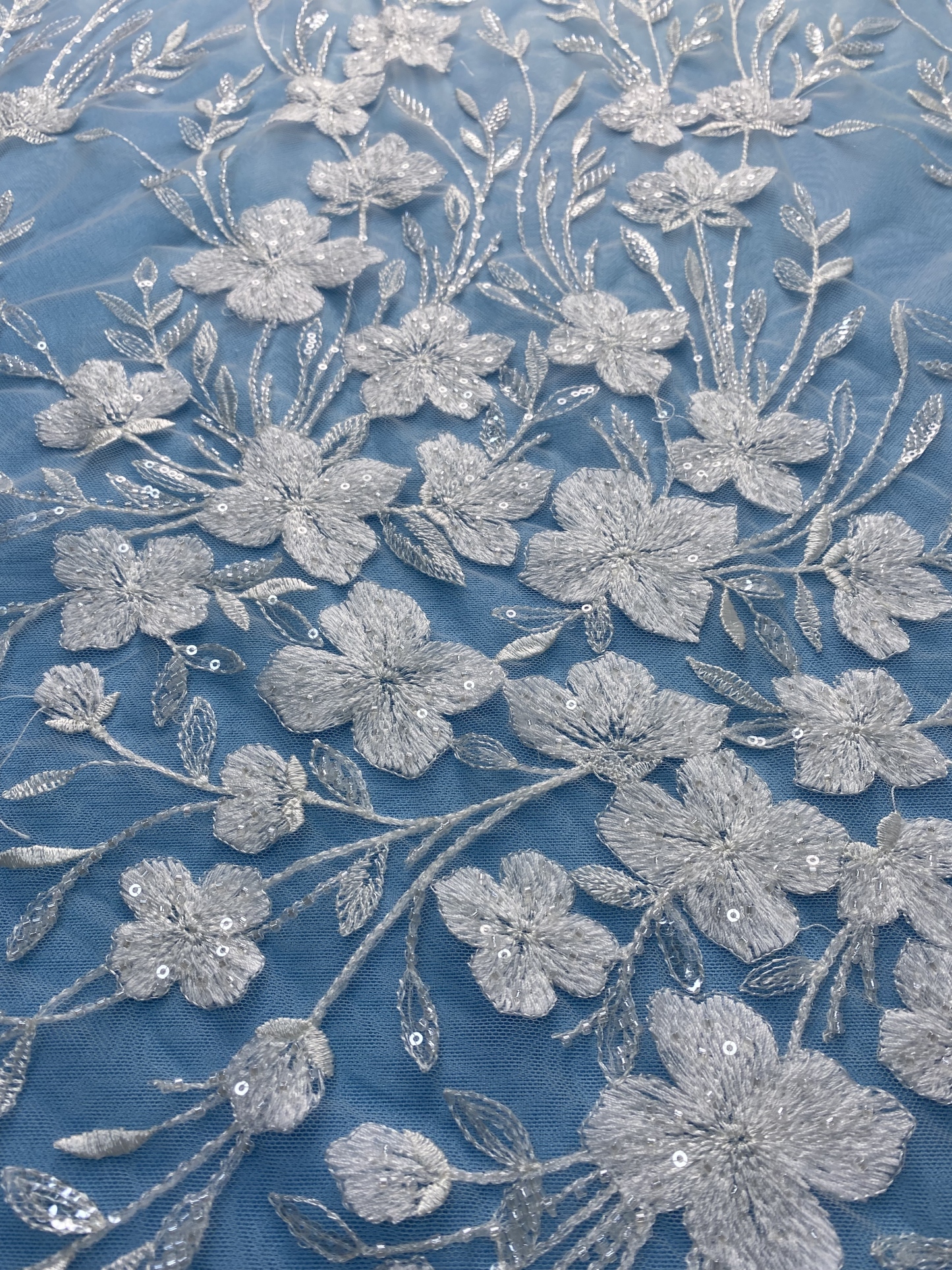 Ivory Fabric with Delicate Floral Embroidery & Sparkling Sequins! Perfect for Wedding Dresses/Evening Wear. Premium Craftsmanship—Grab This Exquisite Material Now!