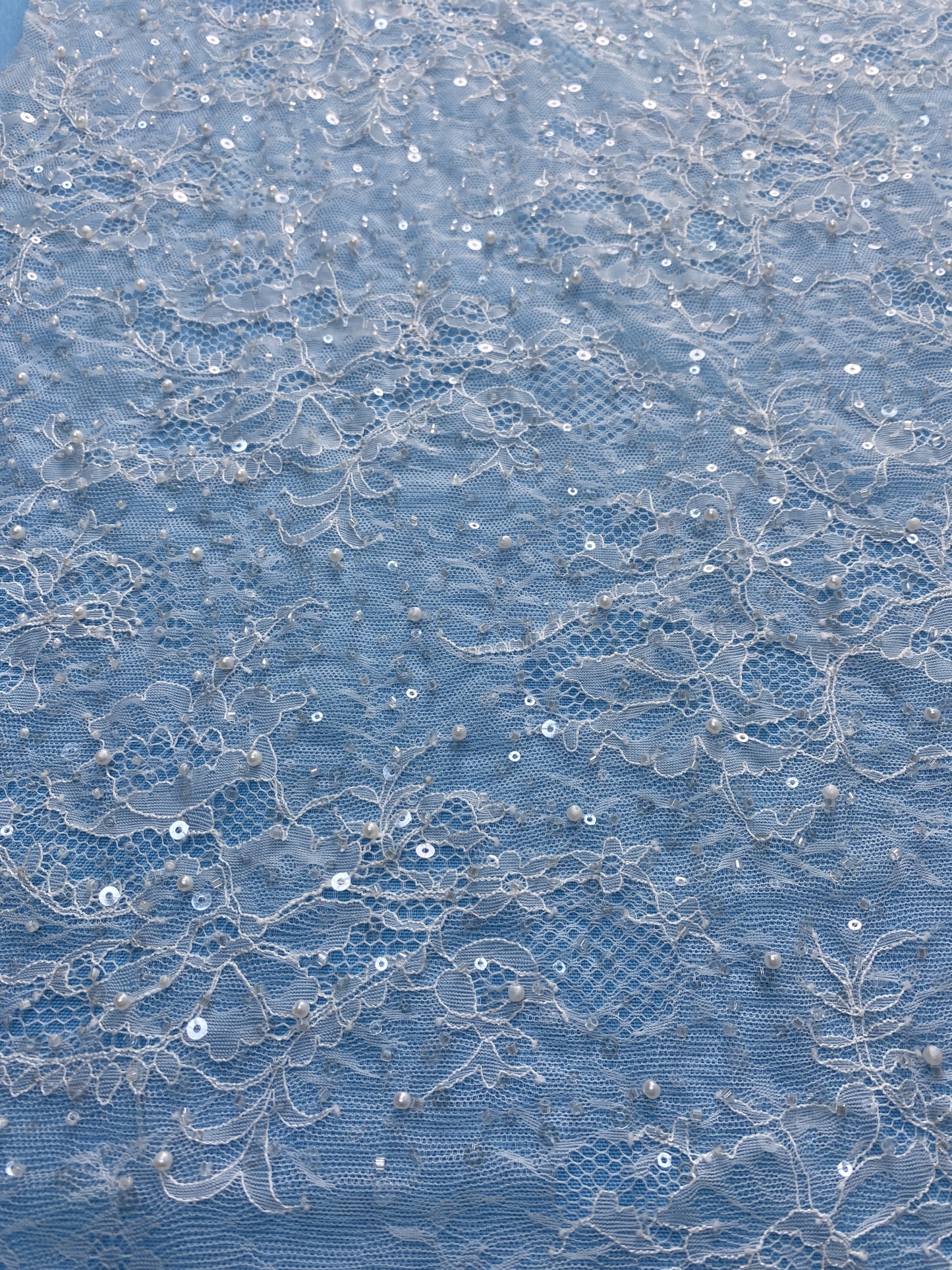 Ivory Fabric with Exquisite Floral Embroidery! Features Delicate Leaf Patterns, Perfect for Wedding Dresses/Chic Evening Wear. Premium Craft—Shop Now!