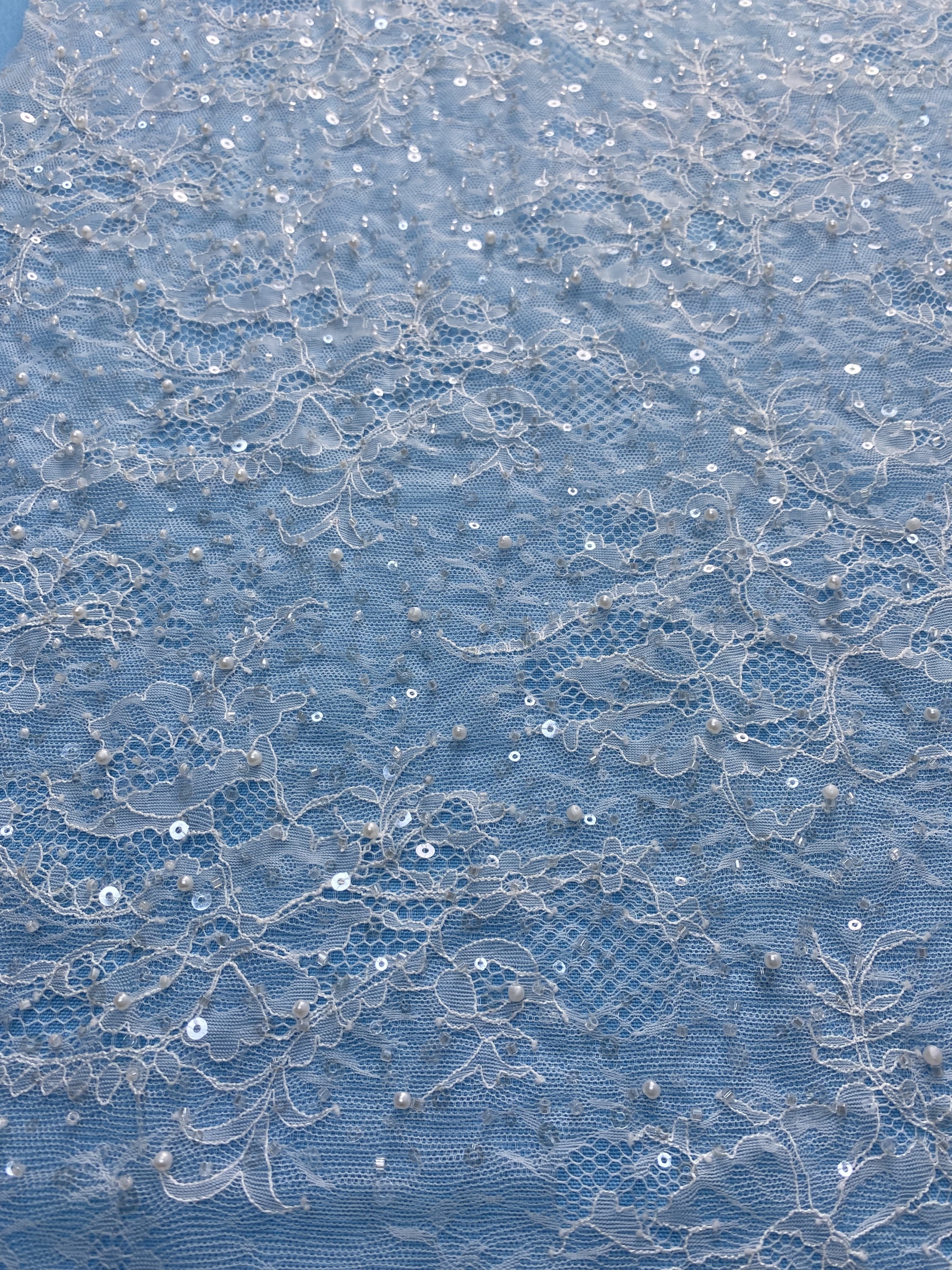 Ivory Fabric with Exquisite Floral Embroidery! Features Delicate Leaf Patterns, Perfect for Wedding Dresses/Chic Evening Wear. Premium Craft—Shop Now!