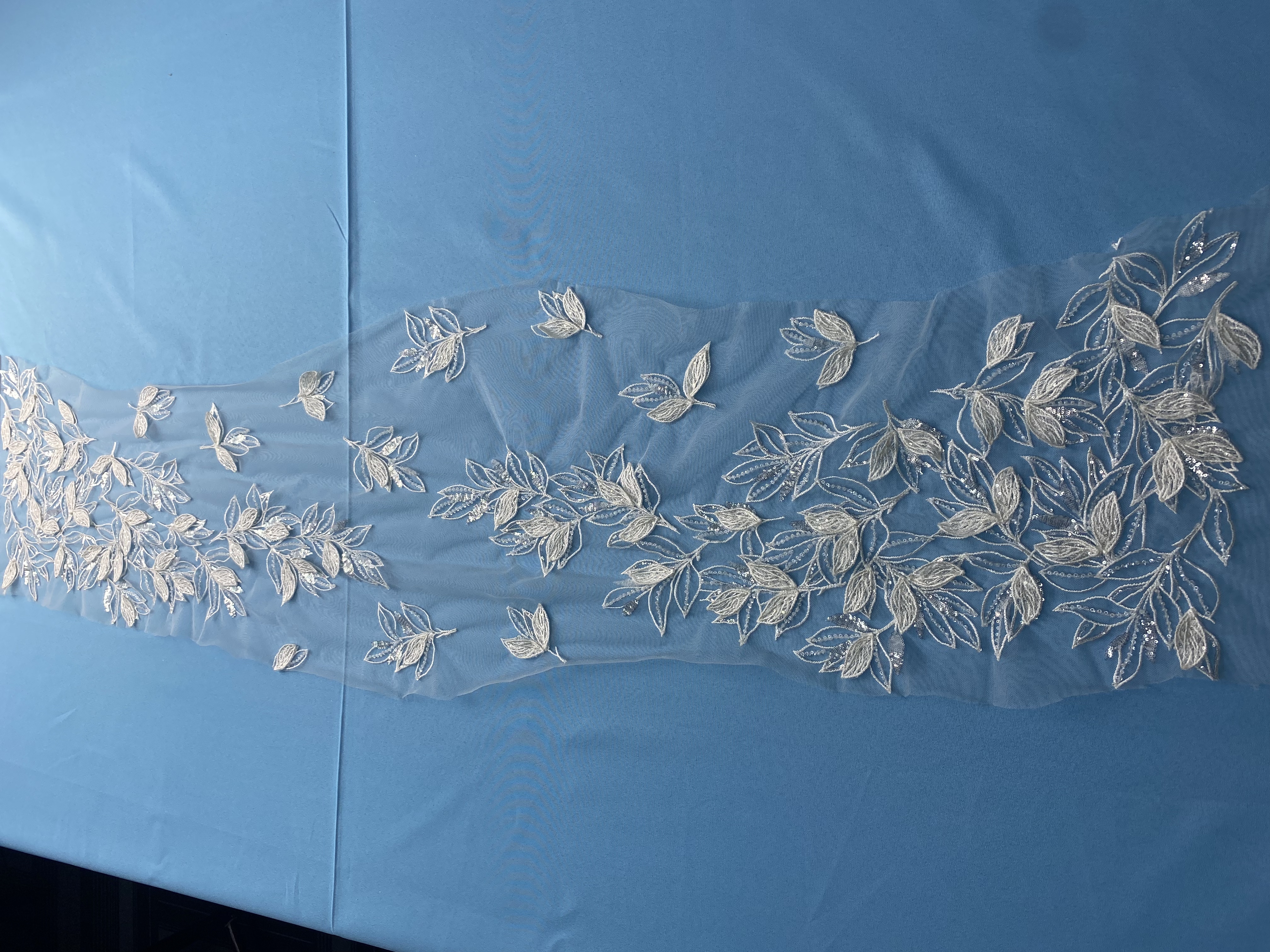 Ivory Tulle Fabric! Adorned with Delicate Leaf Embroidery & Sparkling Sequins. Ideal for Wedding Dresses/Elegant Garments. High-Quality Craftsmanship—Shop This Stunning Material Now!