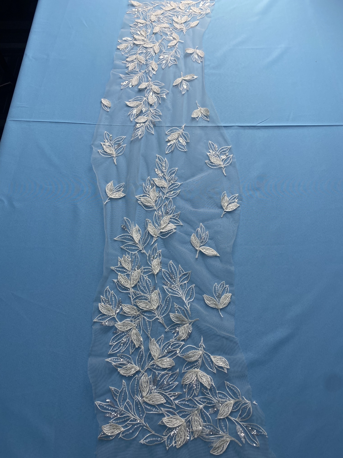 Ivory Tulle Fabric! Adorned with Delicate Leaf Embroidery & Sparkling Sequins. Ideal for Wedding Dresses/Elegant Garments. High-Quality Craftsmanship—Shop This Stunning Material Now!