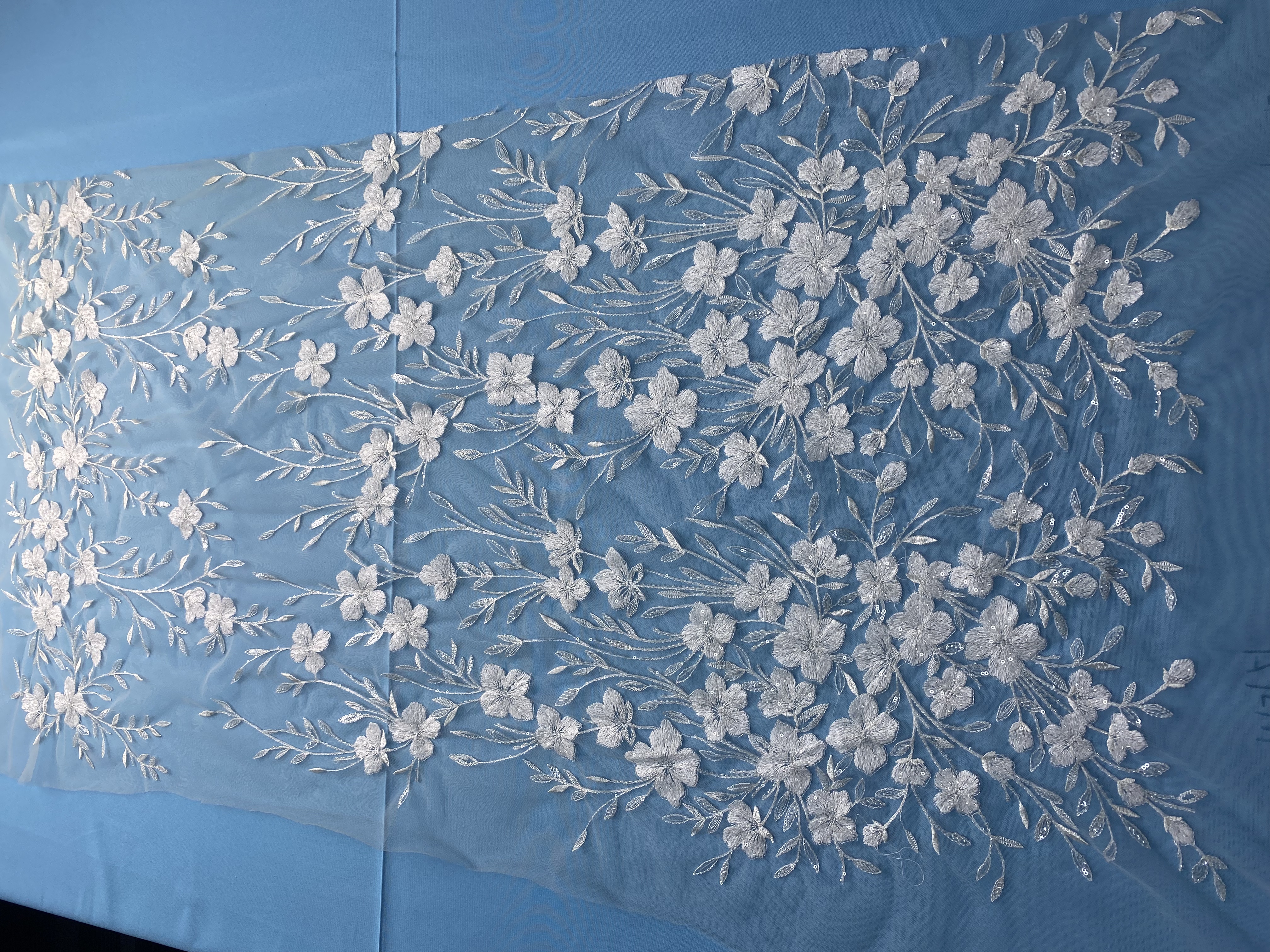 Ivory Fabric with Delicate Floral Embroidery & Sparkling Sequins! Perfect for Wedding Dresses/Evening Wear. Premium Craftsmanship—Grab This Exquisite Material Now!