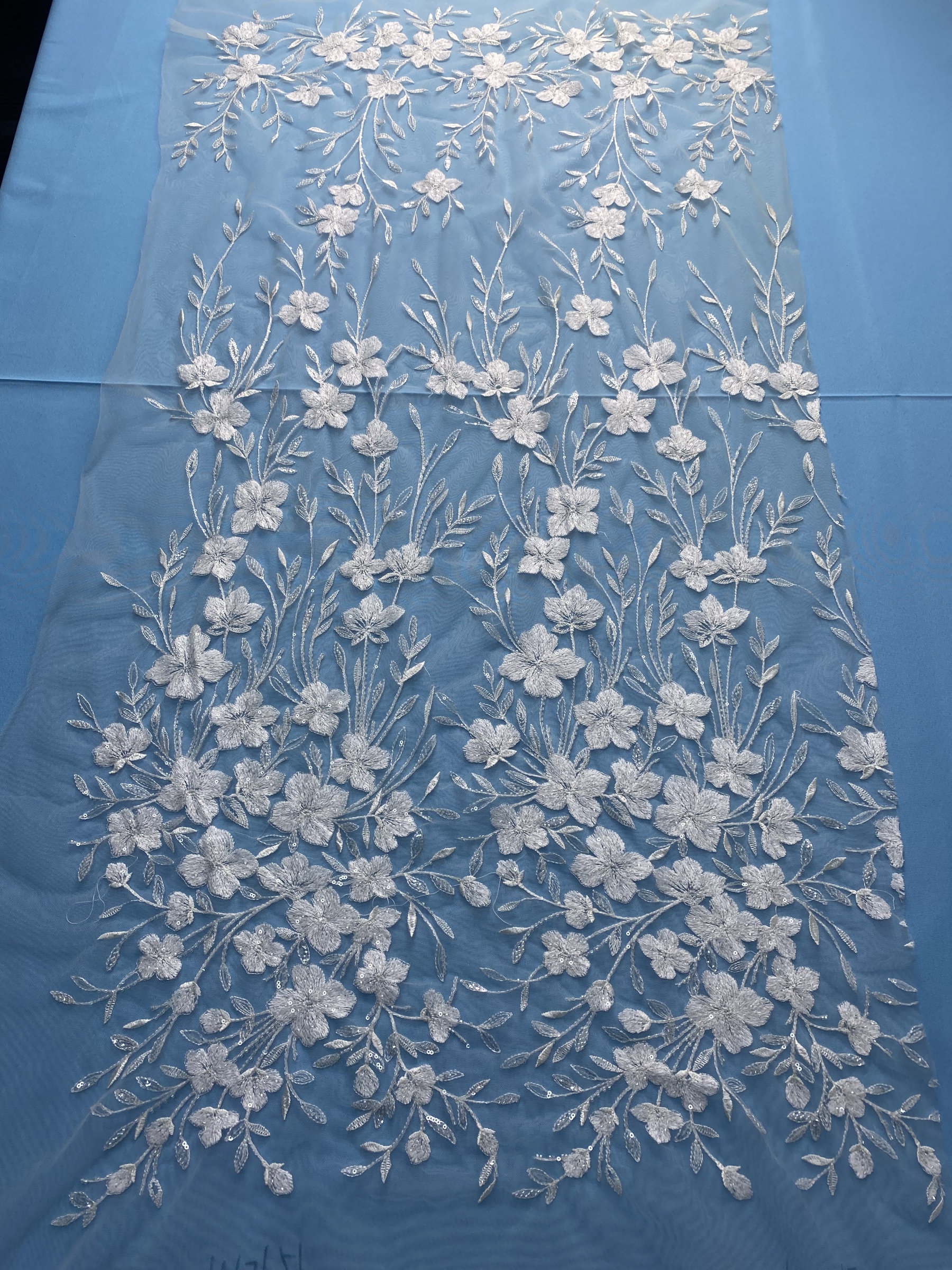 Ivory Fabric with Delicate Floral Embroidery & Sparkling Sequins! Perfect for Wedding Dresses/Evening Wear. Premium Craftsmanship—Grab This Exquisite Material Now!