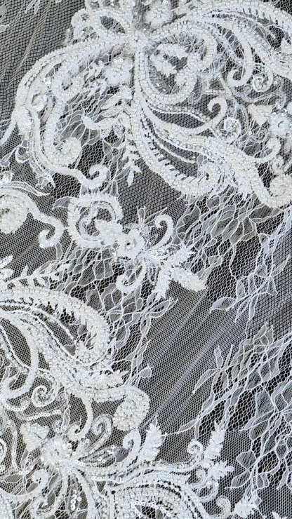 Super Elegant Sequin Tulle Fabric With An Embroidered Floral Pattern of Crystal Beads And Sparkling Sequin Flowers.