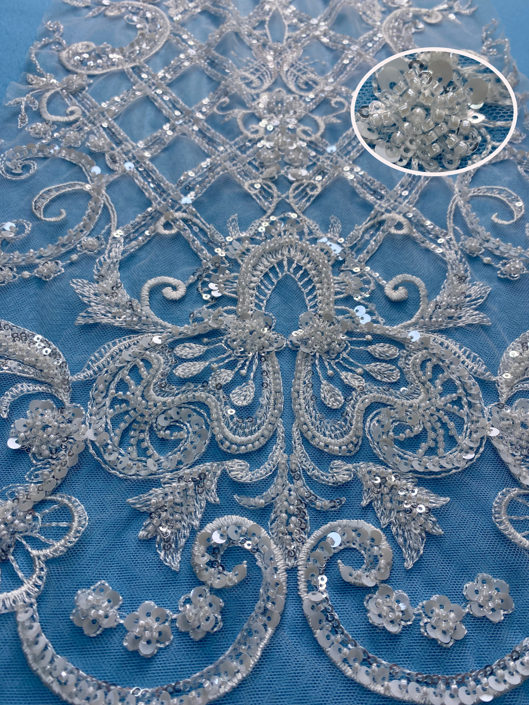Gorgeous Ivory Fabric! Adorned with Intricate Embroidery, Sparkling Sequins & Beads. Ideal for Wedding Dresses/Evening Wear. Premium Craftsmanship—Shop This Exquisite Material Now!