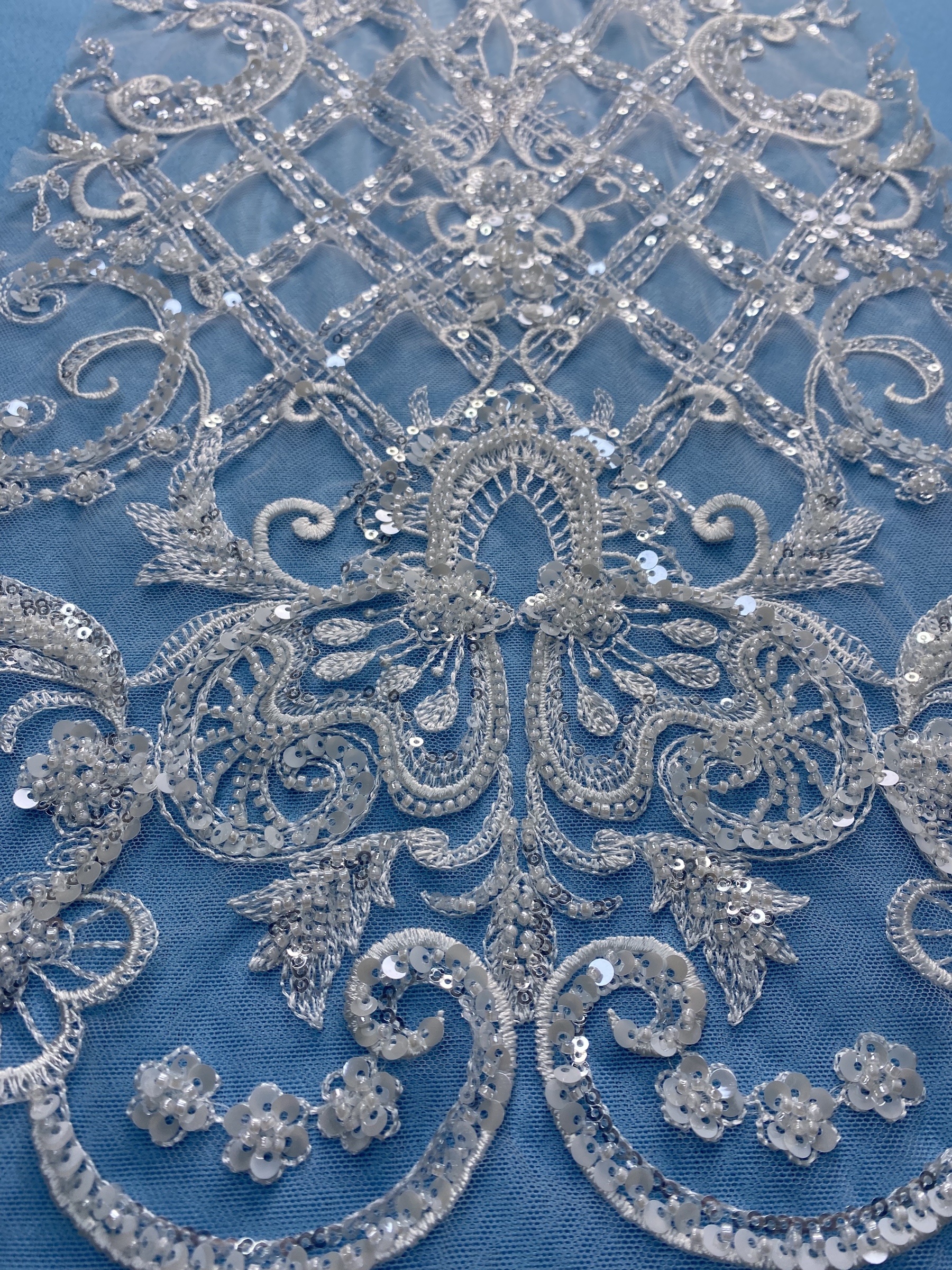 Gorgeous Ivory Fabric! Adorned with Intricate Embroidery, Sparkling Sequins & Beads. Ideal for Wedding Dresses/Evening Wear. Premium Craftsmanship—Shop This Exquisite Material Now!