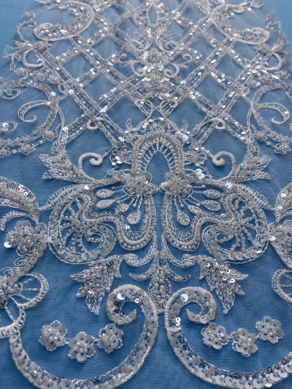 Gorgeous Ivory Fabric! Adorned with Intricate Embroidery, Sparkling Sequins & Beads. Ideal for Wedding Dresses/Evening Wear. Premium Craftsmanship—Shop This Exquisite Material Now!